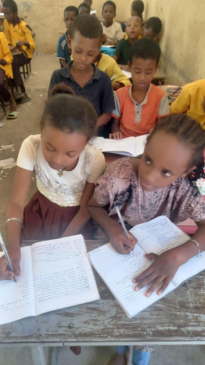 Children learning together in a bright, welcoming classroom